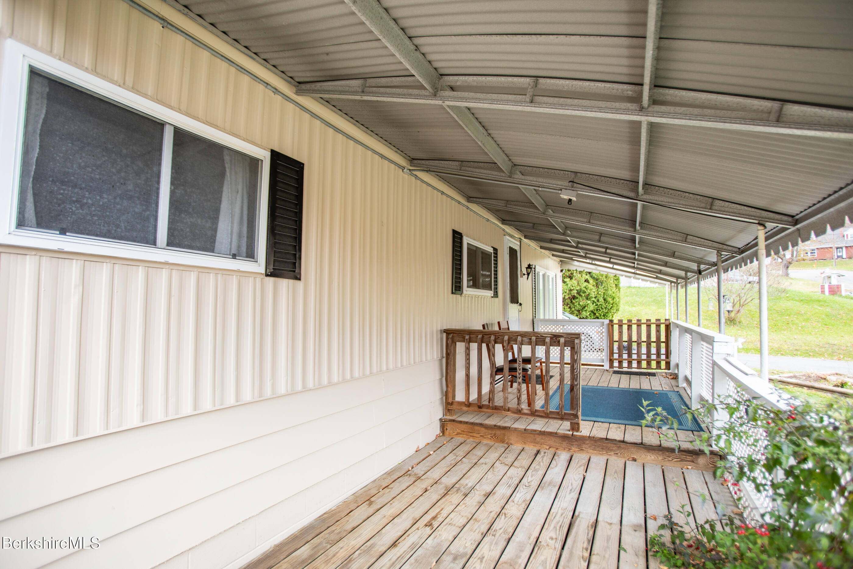 21 Overlook Terrace Adams, MA 01220 - Photo 4 of 31 a view of porch with a table and chairs