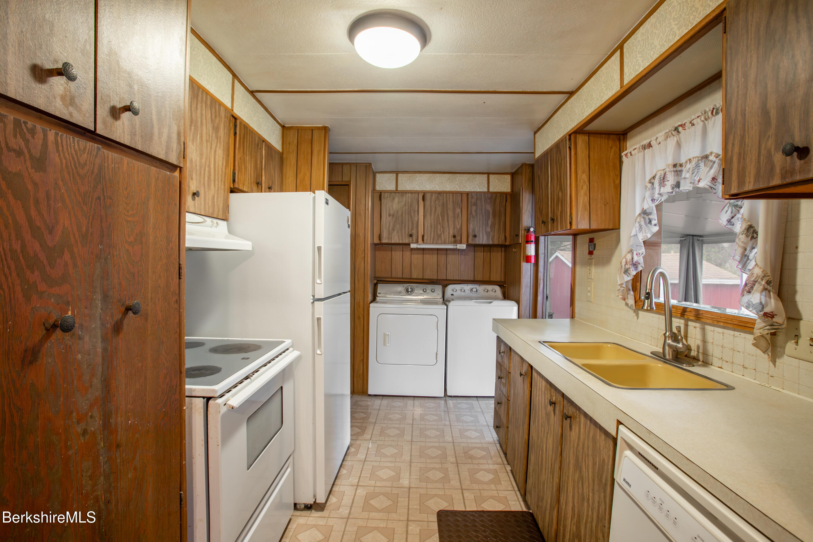 21 Overlook Terrace Adams, MA 01220 - Photo 8 of 31 a kitchen with a refrigerator sink stove and cabinets