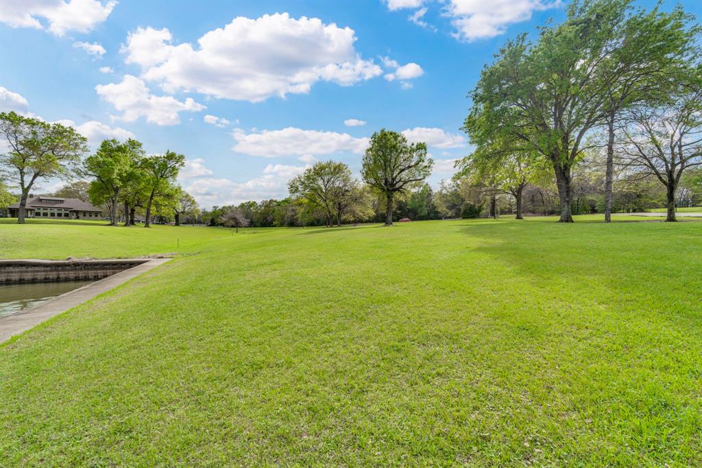A2000 Azure Lane Streetman, TX 75859 - Photo 10 of 12 a view of a field with trees in the background