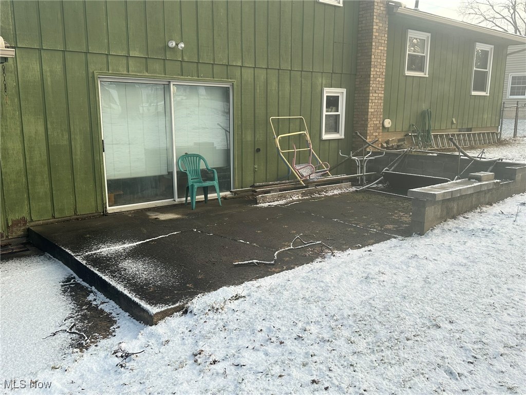 97 West Howe Road Tallmadge, OH 44278 - Photo 5 of 35 View of snow covered patio