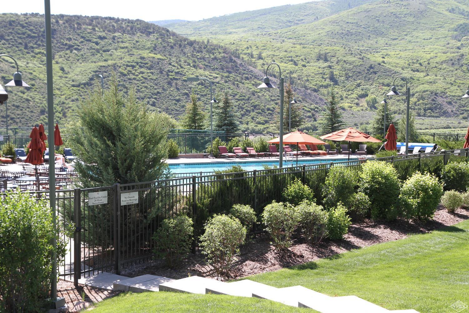 599 Gray Rock Drive Eagle, CO 81631 - Photo 14 of 19 a view of a lake with a mountain