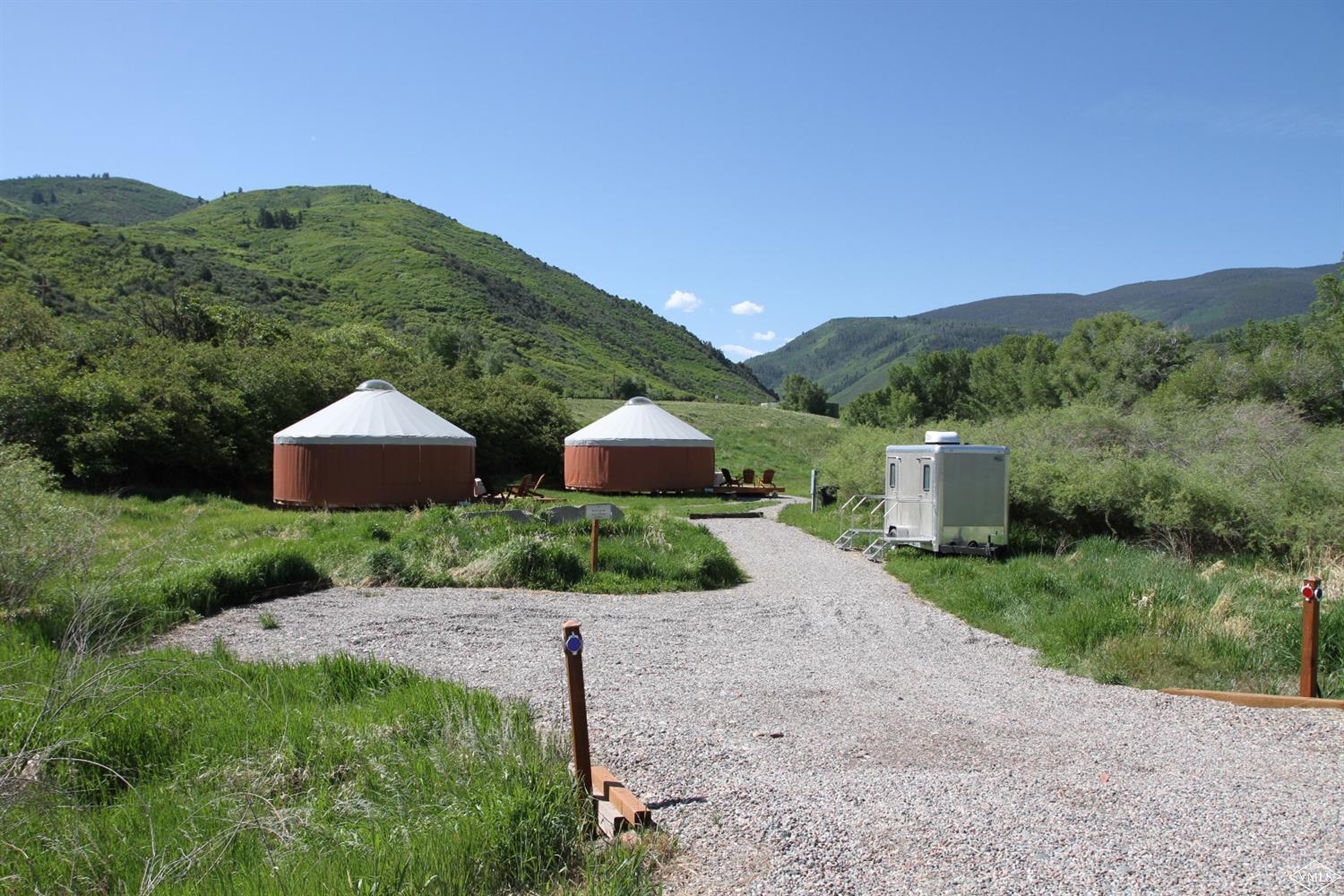 599 Gray Rock Drive Eagle, CO 81631 - Photo 18 of 19 a view of house with a yard