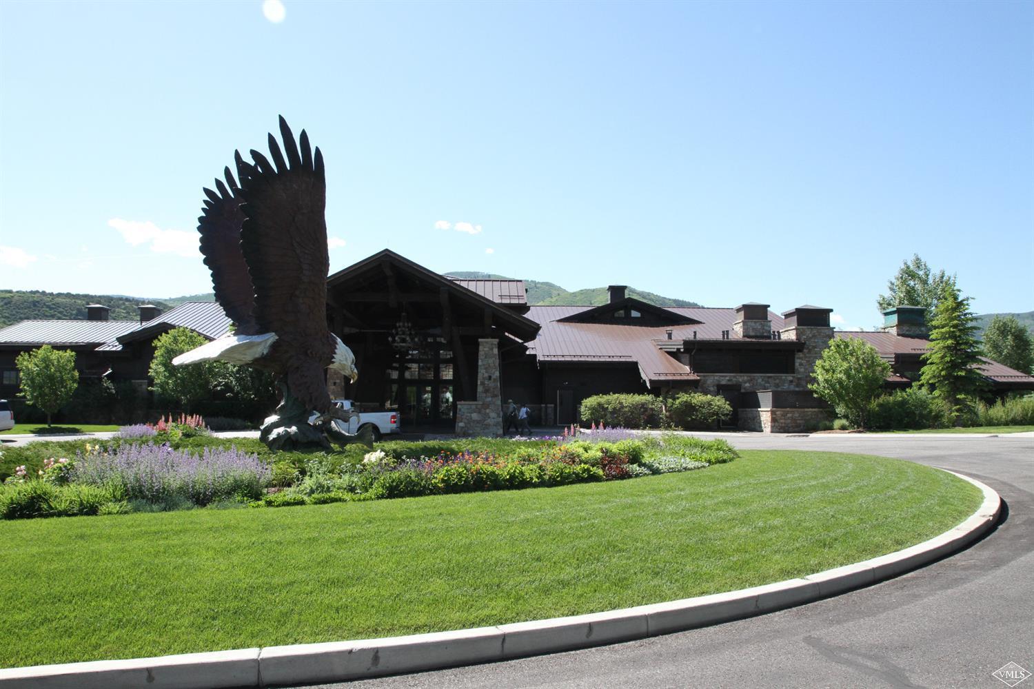 599 Gray Rock Drive Eagle, CO 81631 - Photo 7 of 19 a view of a big house with a big yard and potted plants