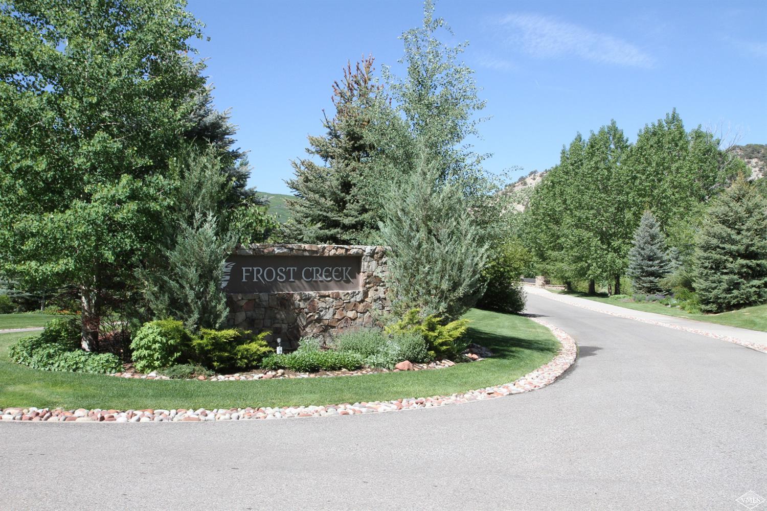 599 Gray Rock Drive Eagle, CO 81631 - Photo 10 of 19 a view of a garden with large trees