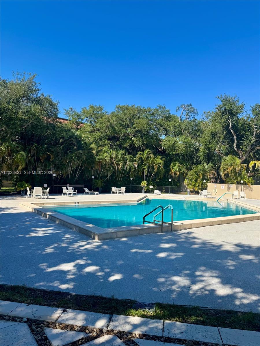 605 Ives Dairy Road, Unit 3067 Miami, FL 33179 - Photo 28 of 28 a view of a street with an outdoor space