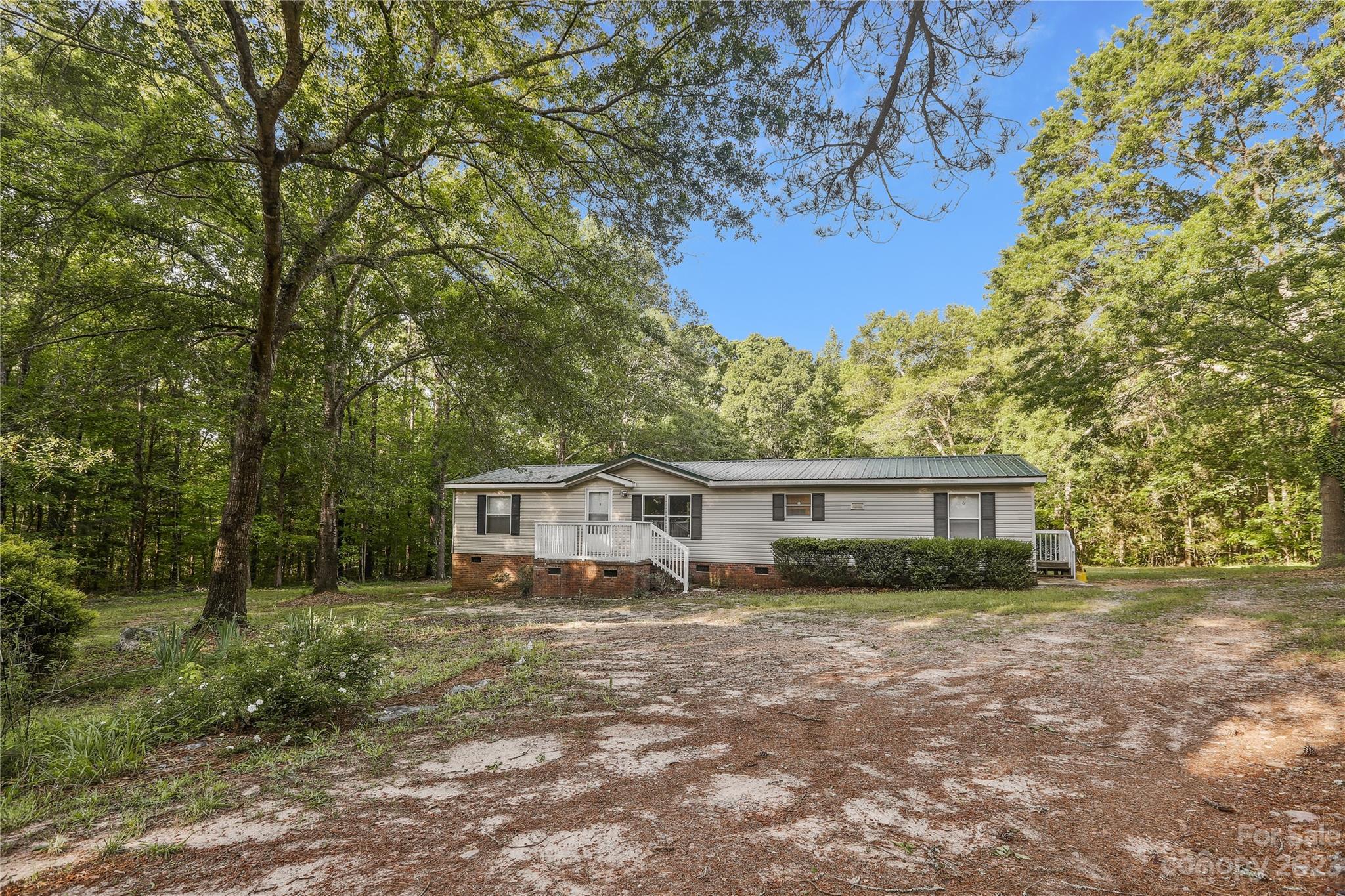 4670 Blade Run Road Edgemoor, SC 29712 - Photo 1 of 26 a view of a house with a yard