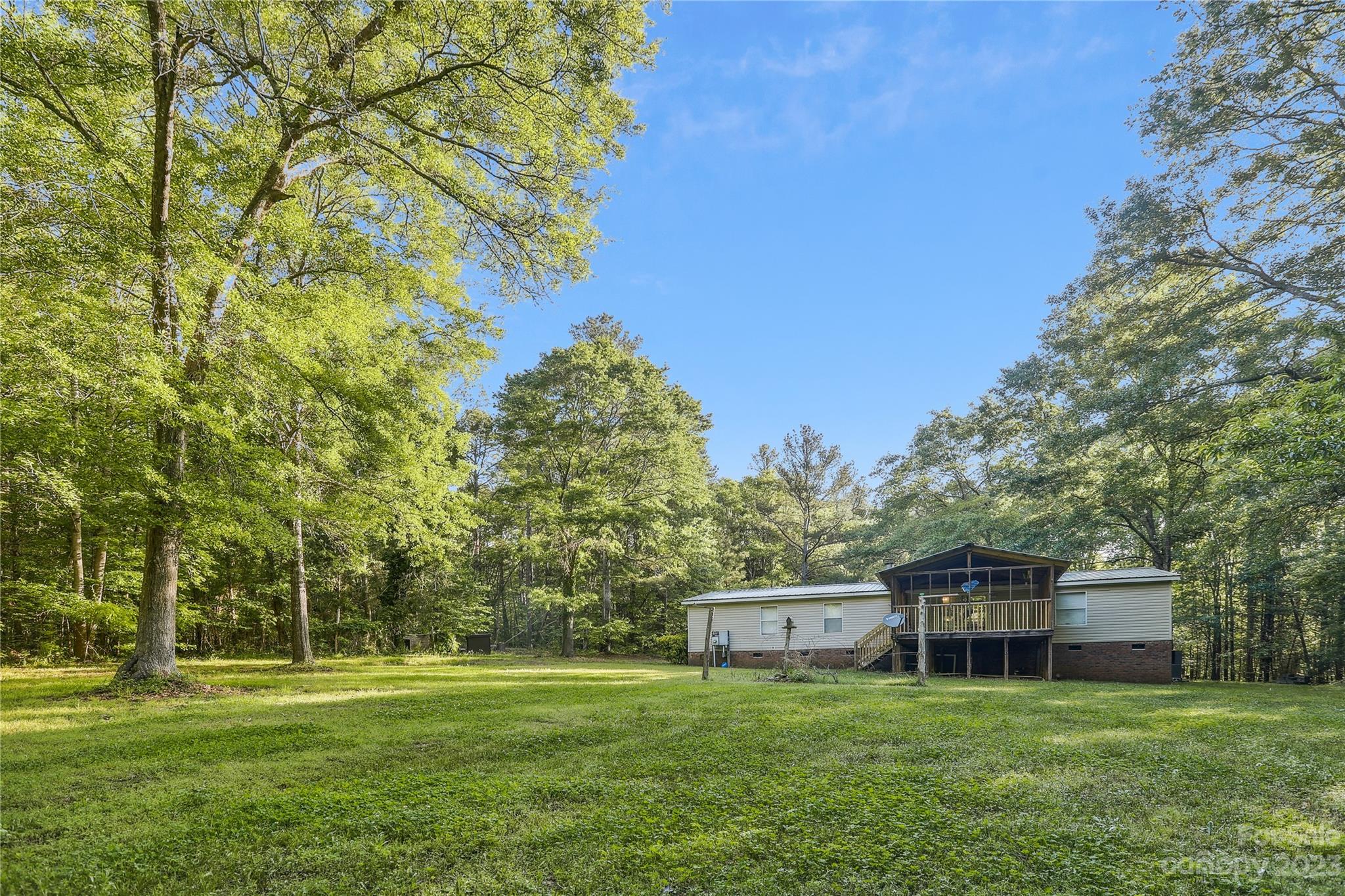 4670 Blade Run Road Edgemoor, SC 29712 - Photo 2 of 26 a view of a house with a big yard