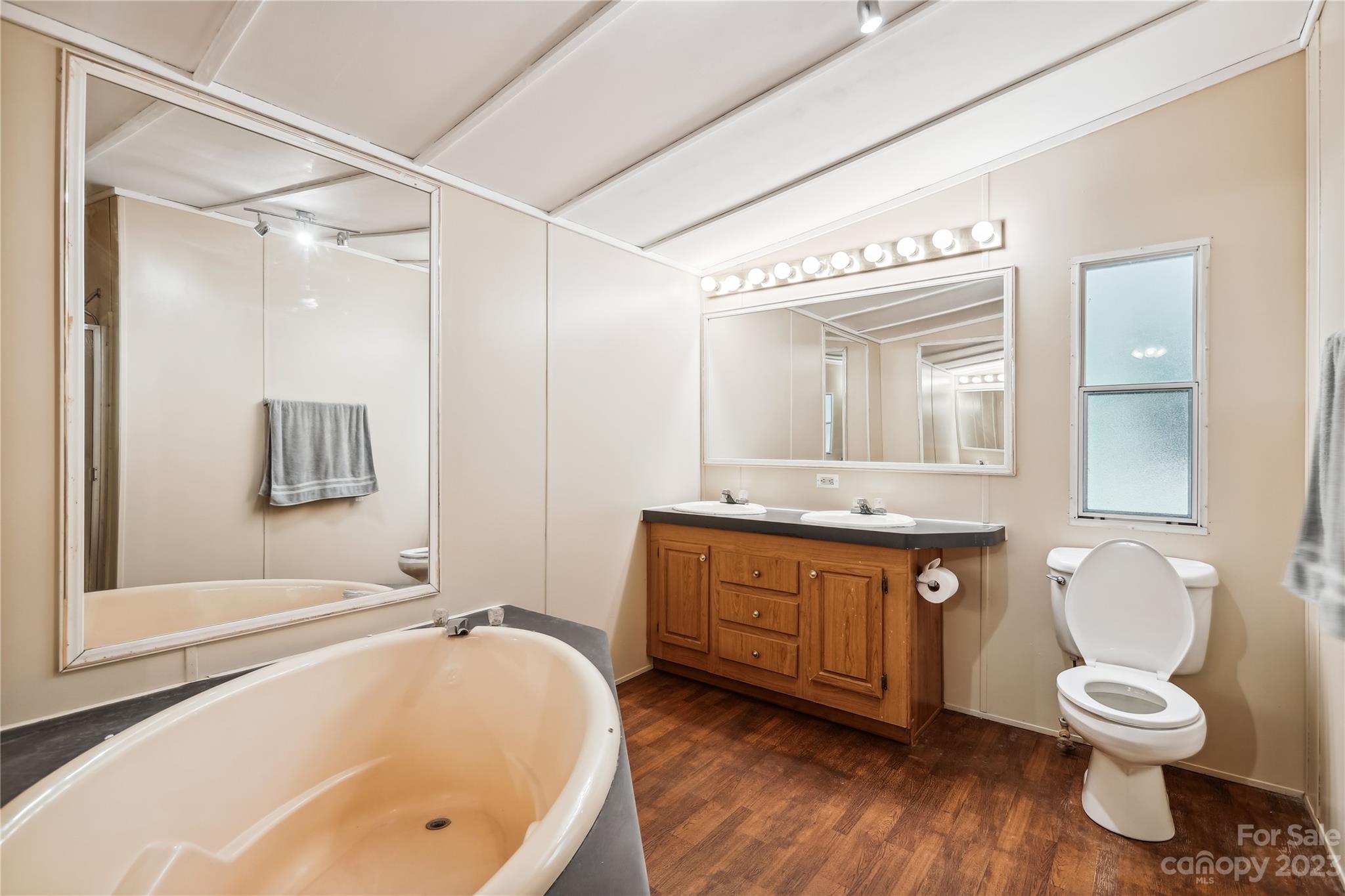 4670 Blade Run Road Edgemoor, SC 29712 - Photo 21 of 26 a bathroom with a granite countertop sink toilet and shower