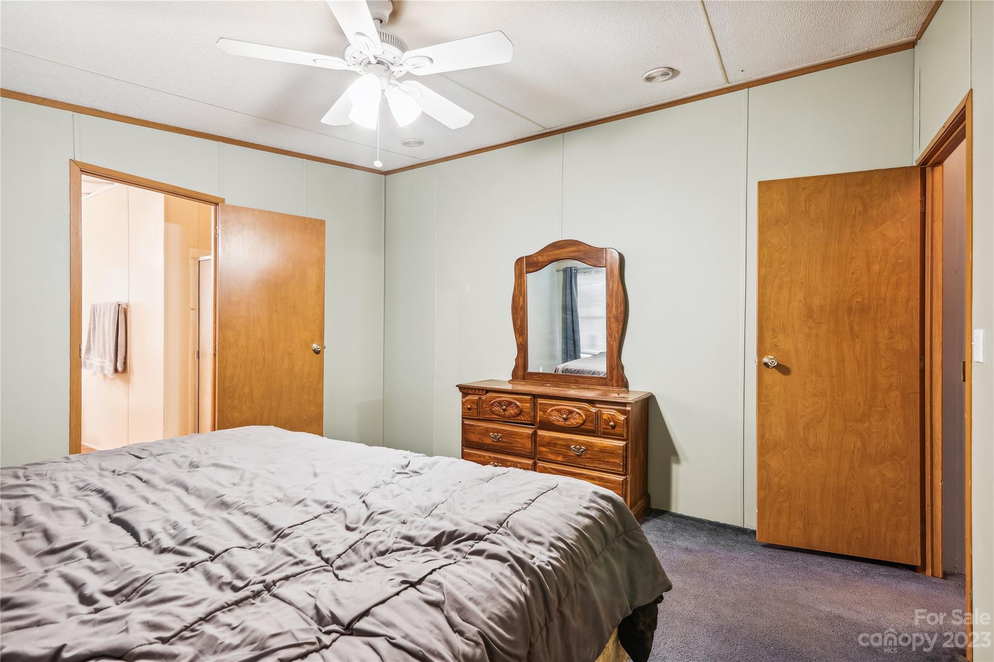 4670 Blade Run Road Edgemoor, SC 29712 - Photo 26 of 26 a bedroom with a bed and a dresser