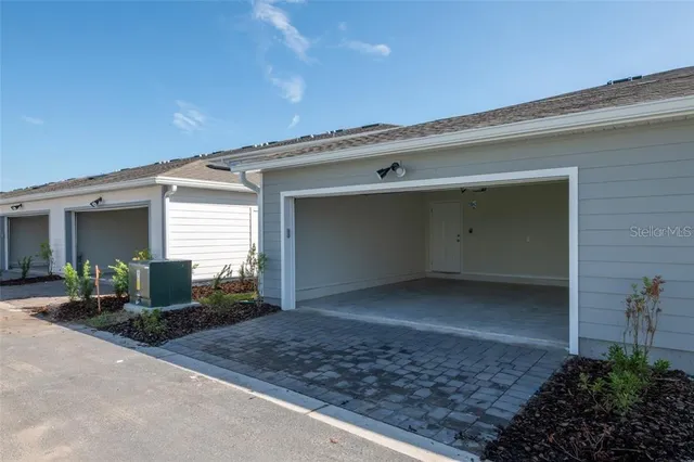 a view of a house with garage