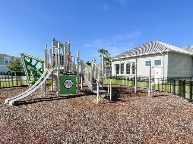 a view of a house with a park