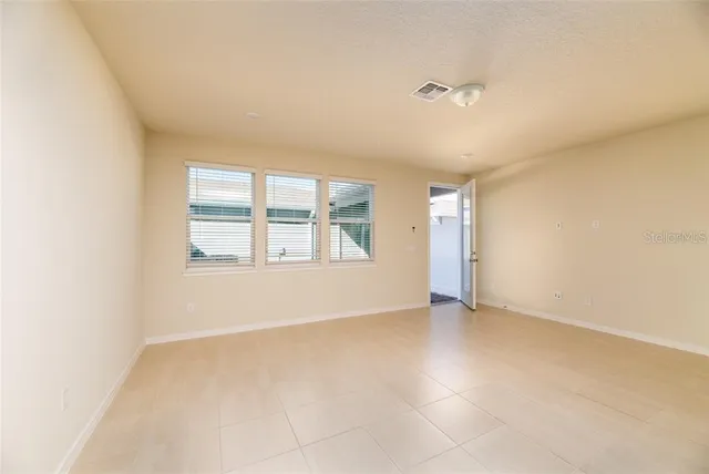 an empty room with windows