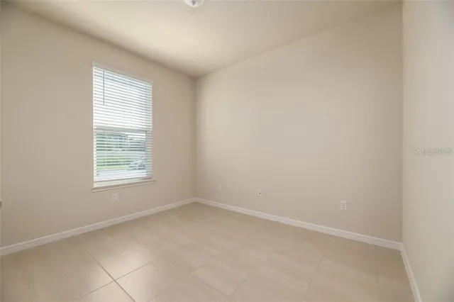 an empty room with a window