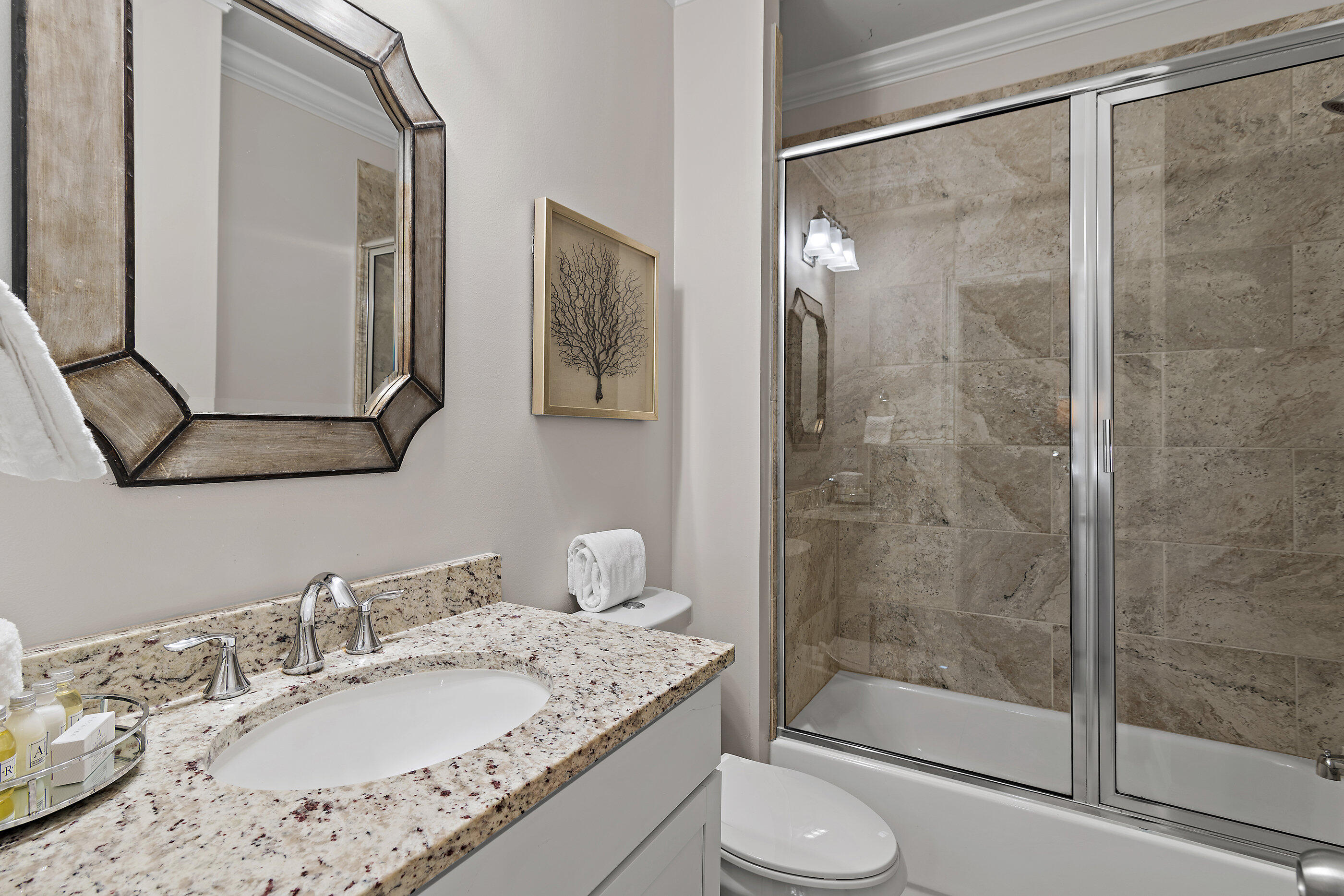 257 Driftwood Road, Unit 11 Miramar Beach, FL 32550 - Photo 13 of 40 a bathroom with a granite countertop sink toilet and shower