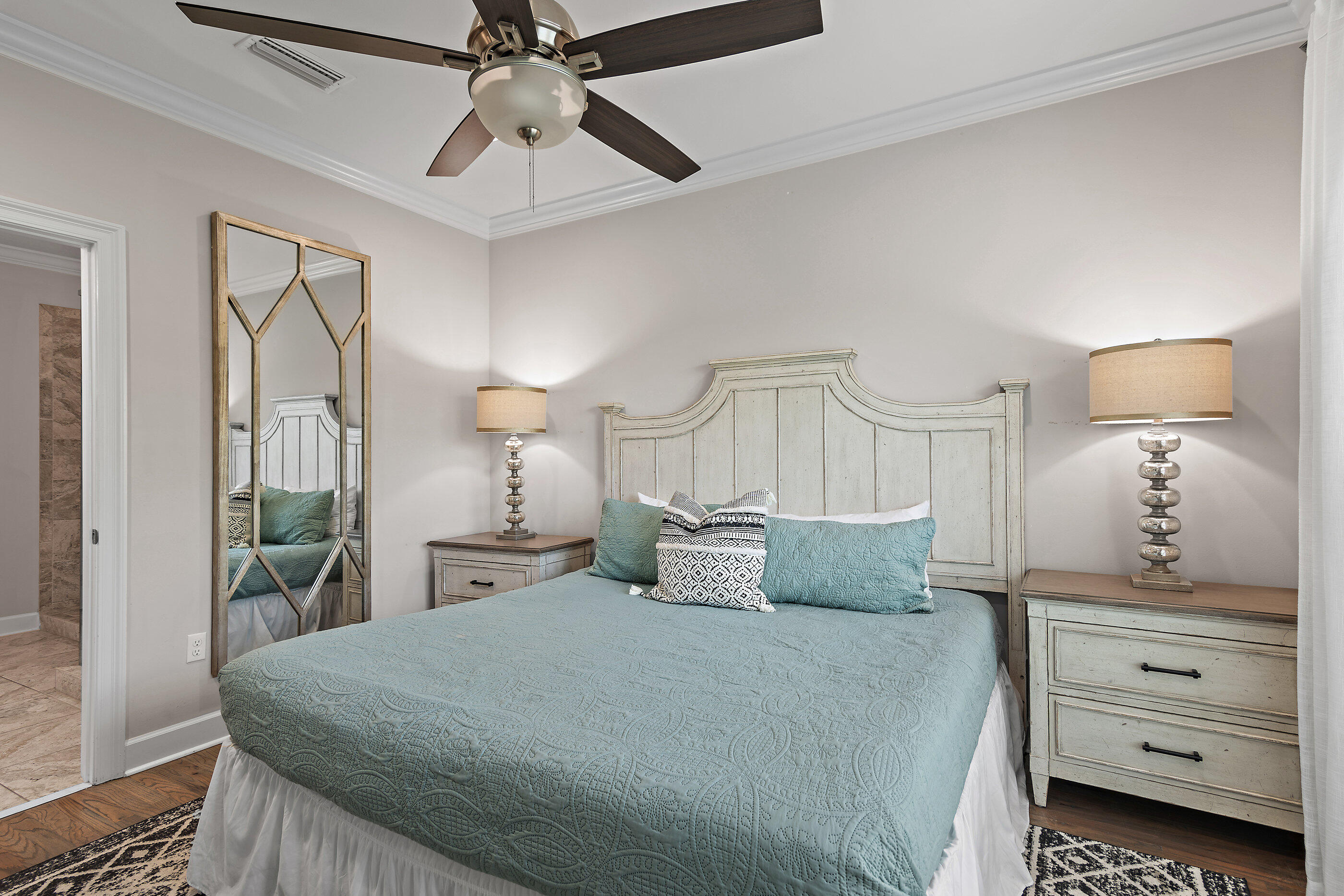 257 Driftwood Road, Unit 11 Miramar Beach, FL 32550 - Photo 18 of 40 a bedroom with a bed and ceiling fan