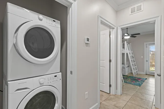 a view of a hallway with washer and dryer