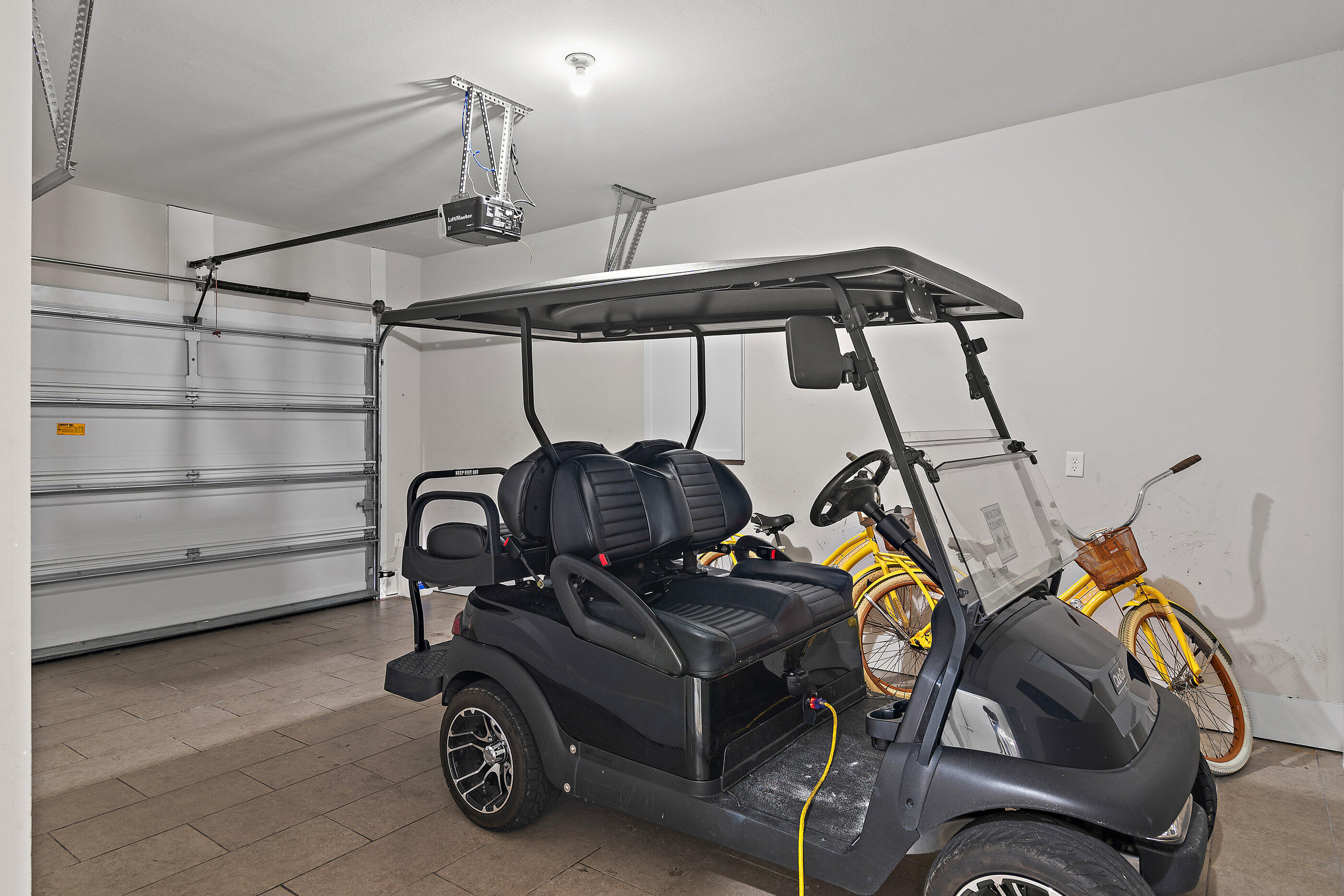 257 Driftwood Road, Unit 11 Miramar Beach, FL 32550 - Photo 34 of 40 a view of gym equipment with racks on the desk