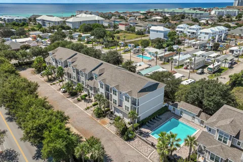 an aerial view of a house with a garden