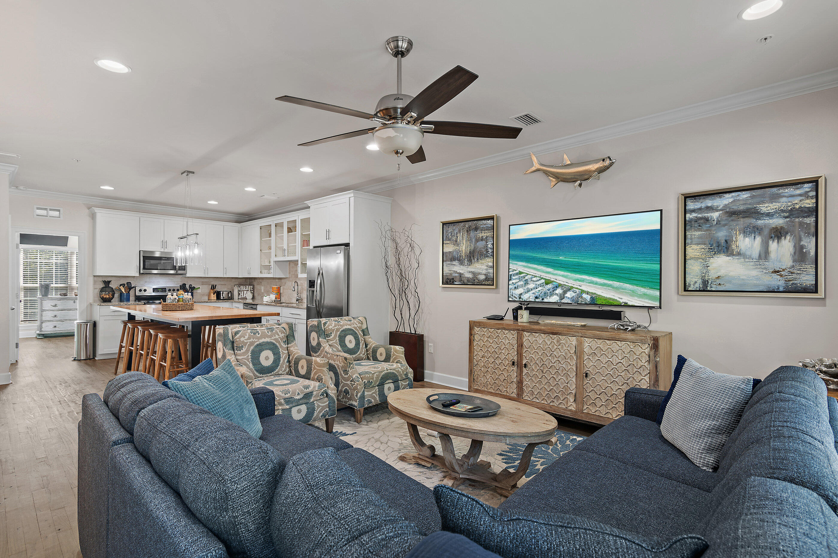 257 Driftwood Road, Unit 11 Miramar Beach, FL 32550 - Photo 5 of 40 a living room with furniture and a flat screen tv