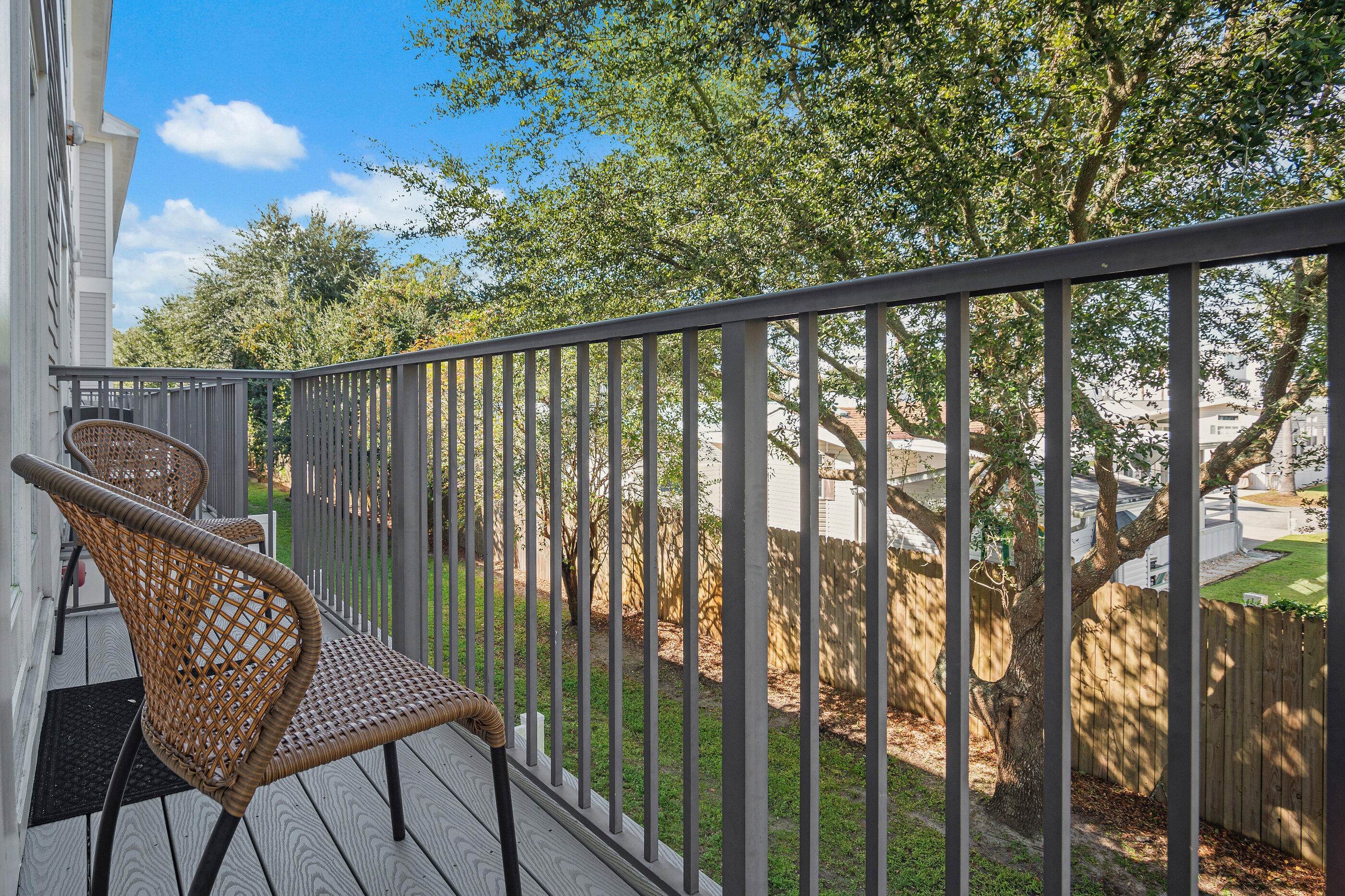 257 Driftwood Road, Unit 11 Miramar Beach, FL 32550 - Photo 6 of 40 a view of a chair and table in the balcony