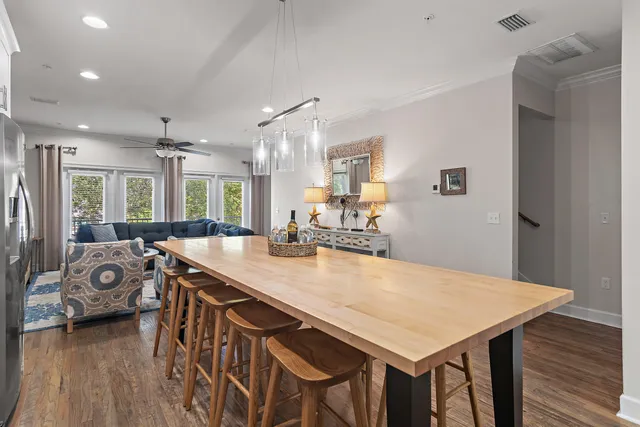 a view of a kitchen and dining room