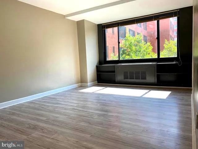 a kitchen with a stove and a microwave