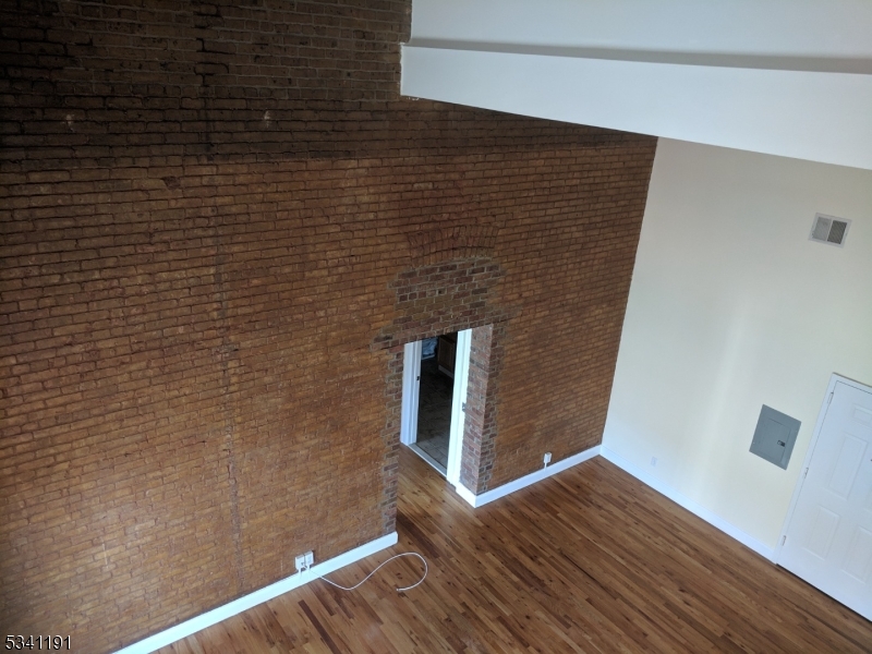 385 George Street, Unit 3B New Brunswick, NJ 08901 - Photo 16 of 18 a view of wooden floor