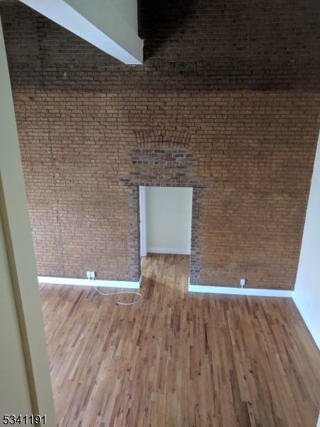 385 George Street, Unit 3B New Brunswick, NJ 08901 - Photo 18 of 18 a view of wooden floor