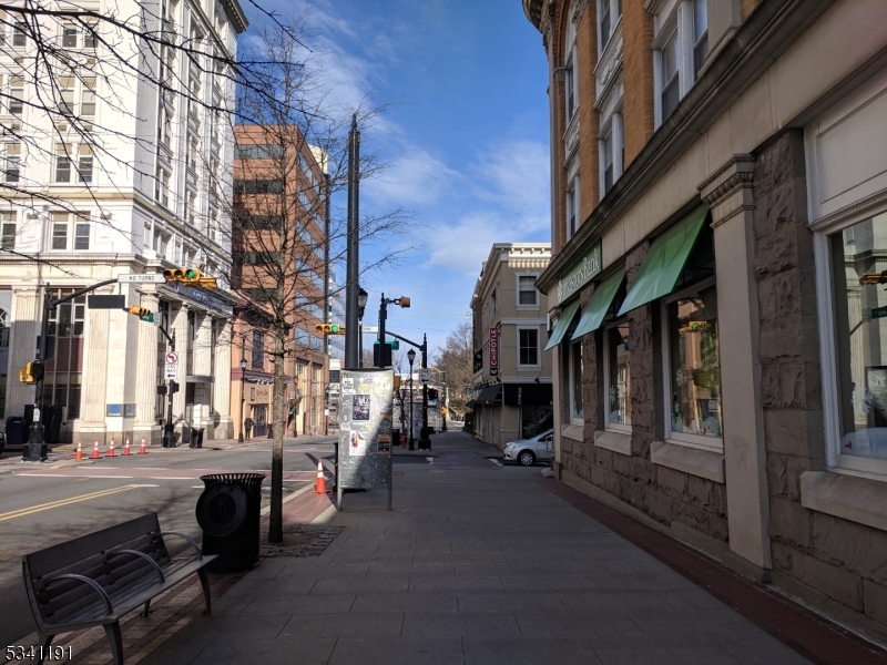 385 George Street, Unit 3B New Brunswick, NJ 08901 - Photo 4 of 18 a view of a street with sitting buildings