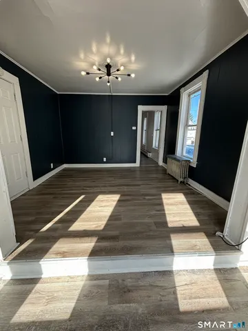 a kitchen with a refrigerator and a sink
