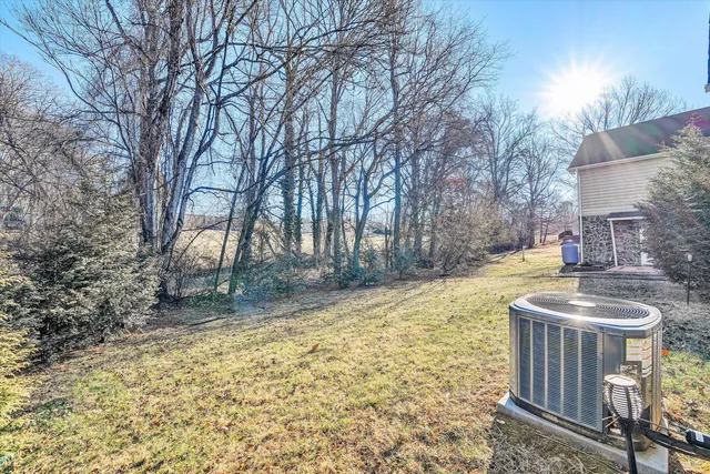 a bathroom with a sink and a yard