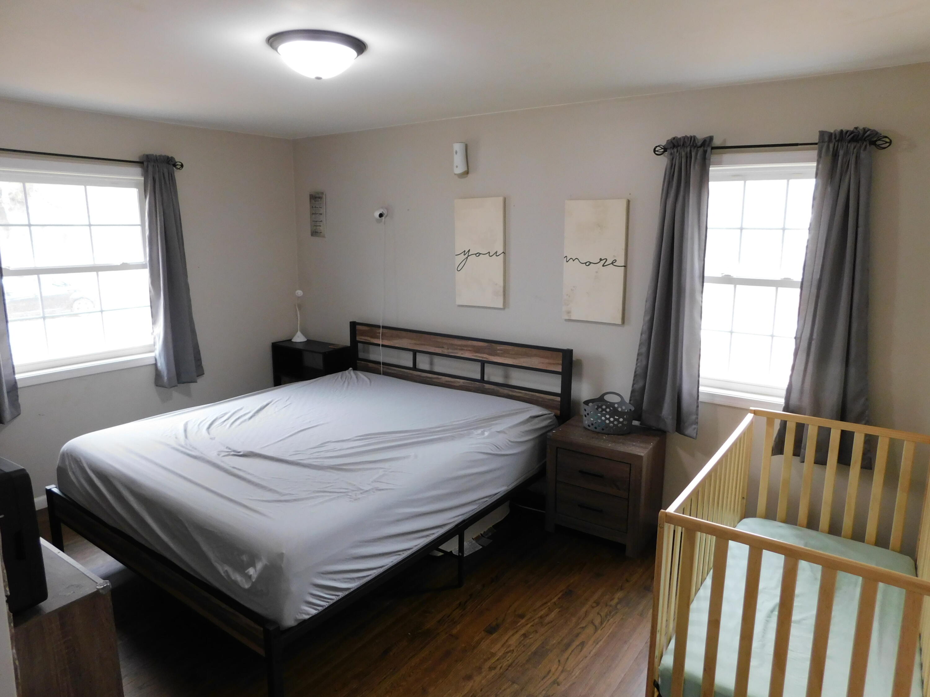 2347 Sloan Street Portage, IN 46368 - Photo 13 of 19 a bedroom with a bed and windows