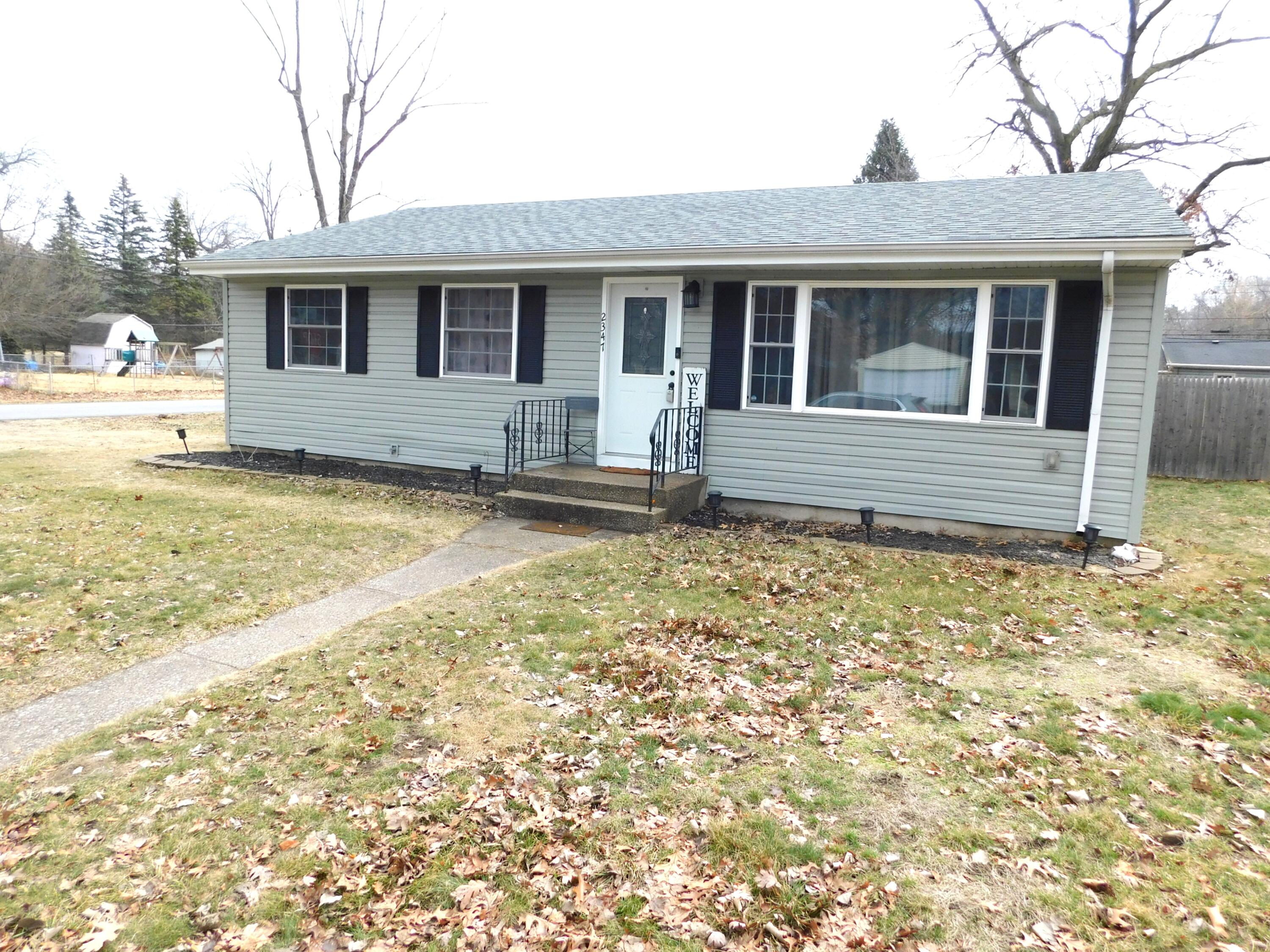 2347 Sloan Street Portage, IN 46368 - Photo 2 of 19 a front view of a house with a yard