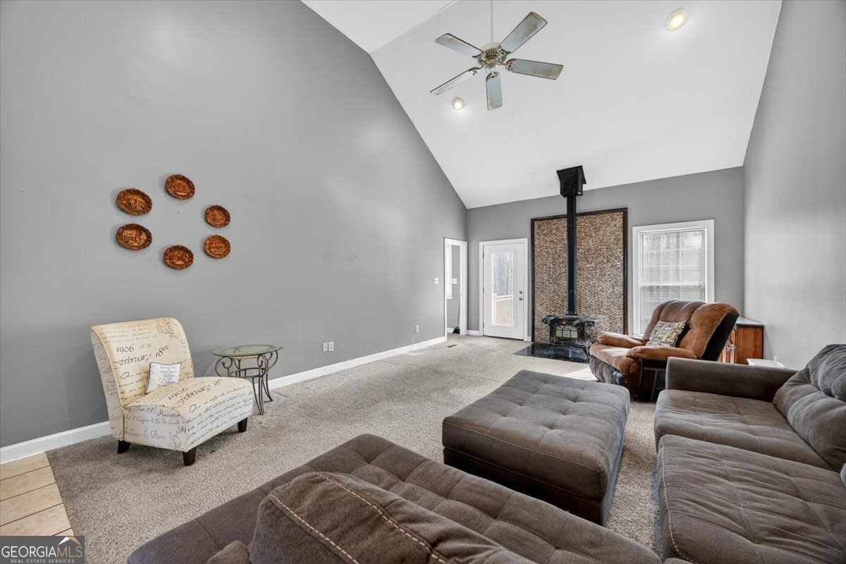 134 Royal Lane Gray, GA 31032 - Photo 5 of 31 a living room with furniture and a large window