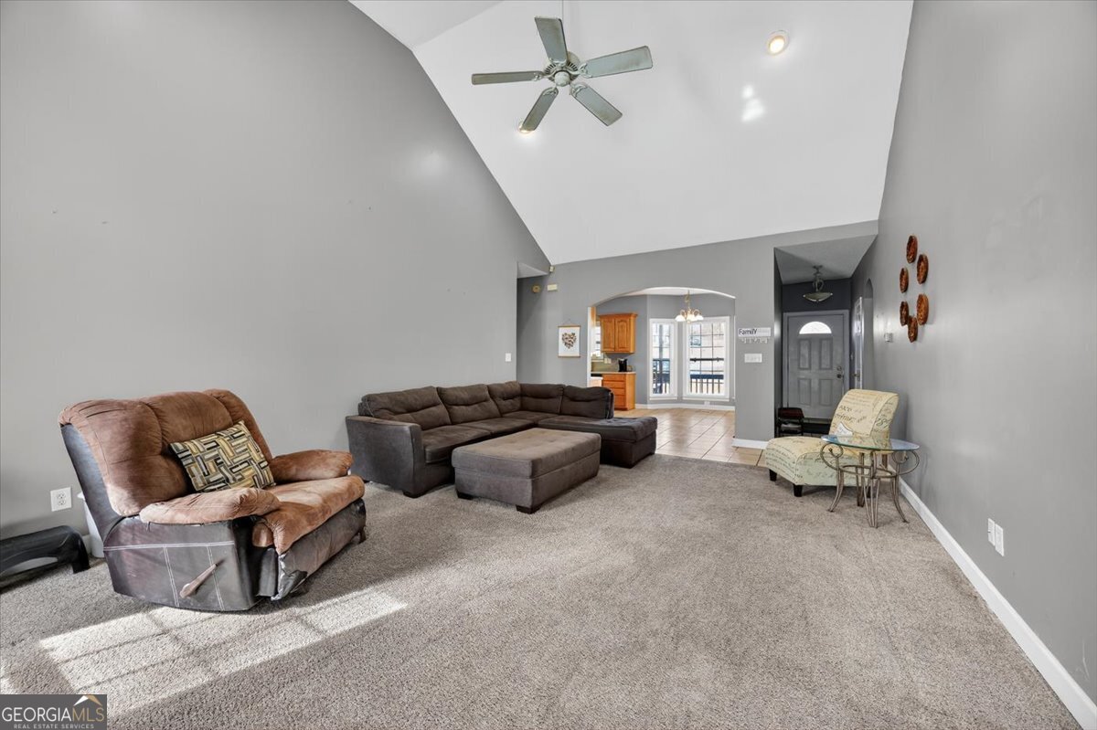 134 Royal Lane Gray, GA 31032 - Photo 7 of 31 a living room with furniture and a chandelier