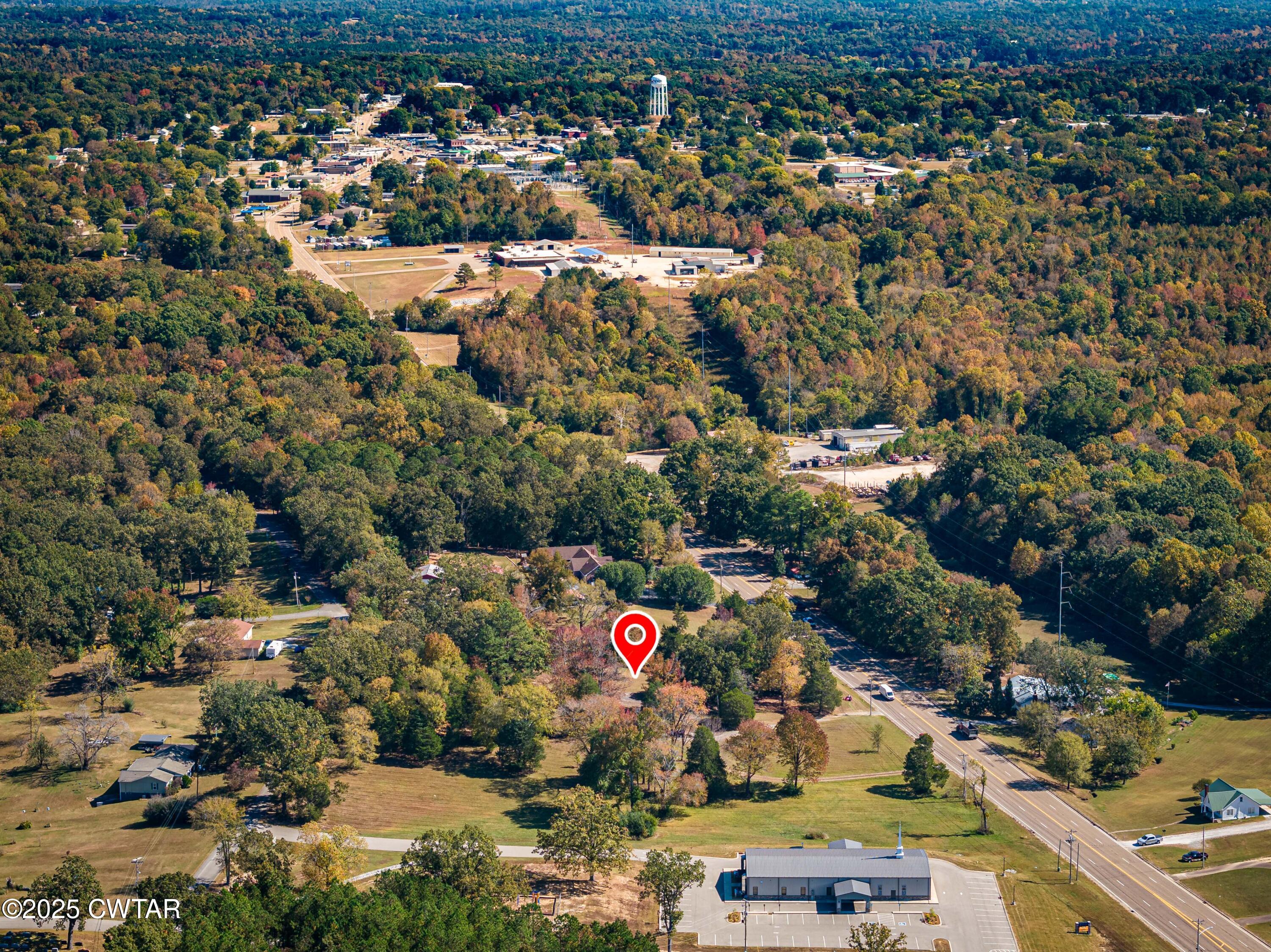 1084 West Main Street Parsons, TN 38363 - Photo 16 of 16 an aerial view of city