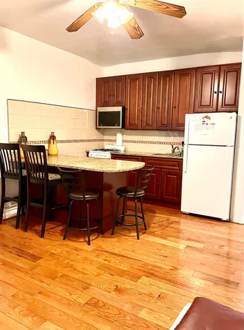 a kitchen with a cabinets and appliances