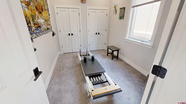 a room with a table and a window