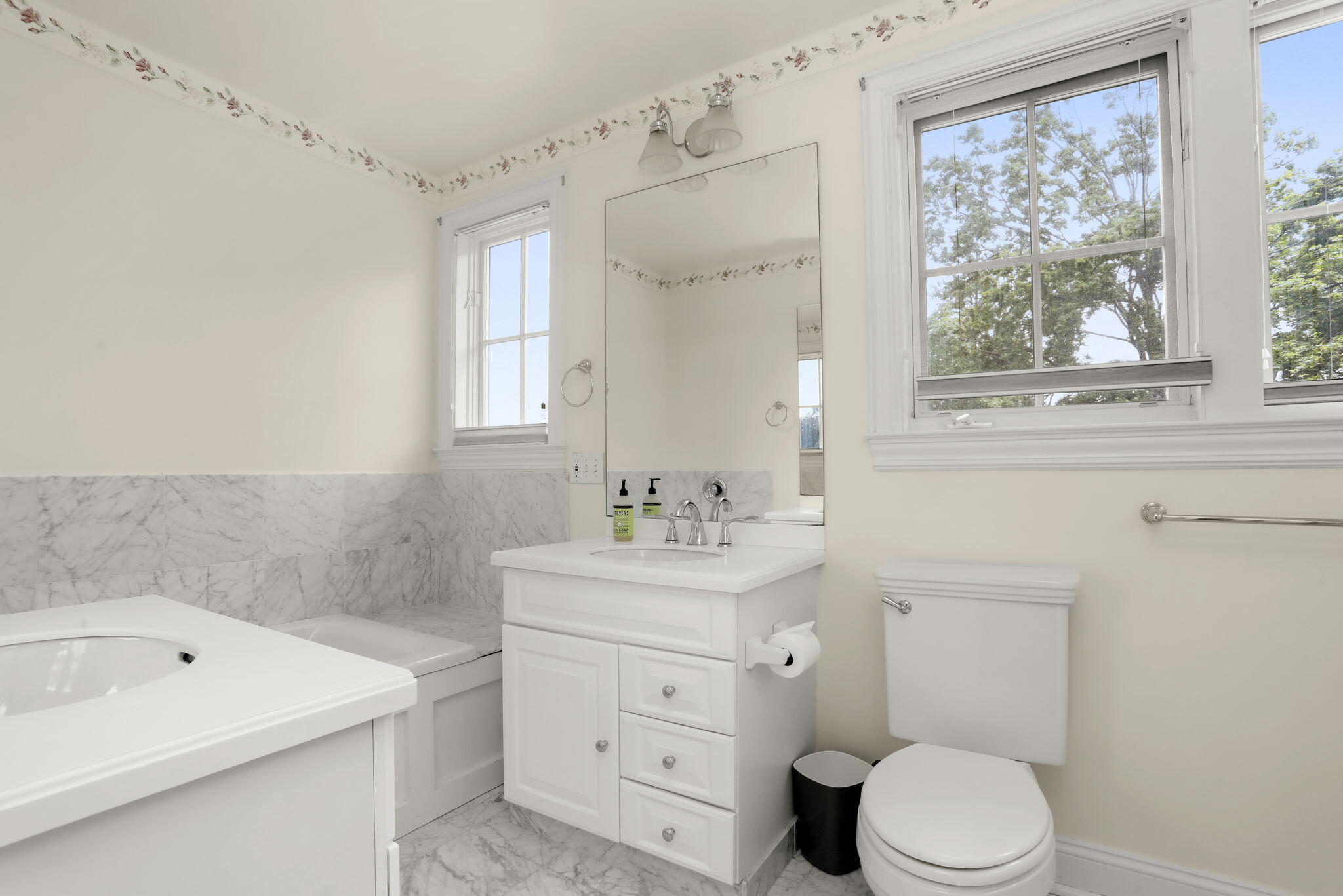 190 Main Street, Unit B New Canaan, CT 06840 - Photo 17 of 32 a bathroom with a sink a toilet and a bathtub