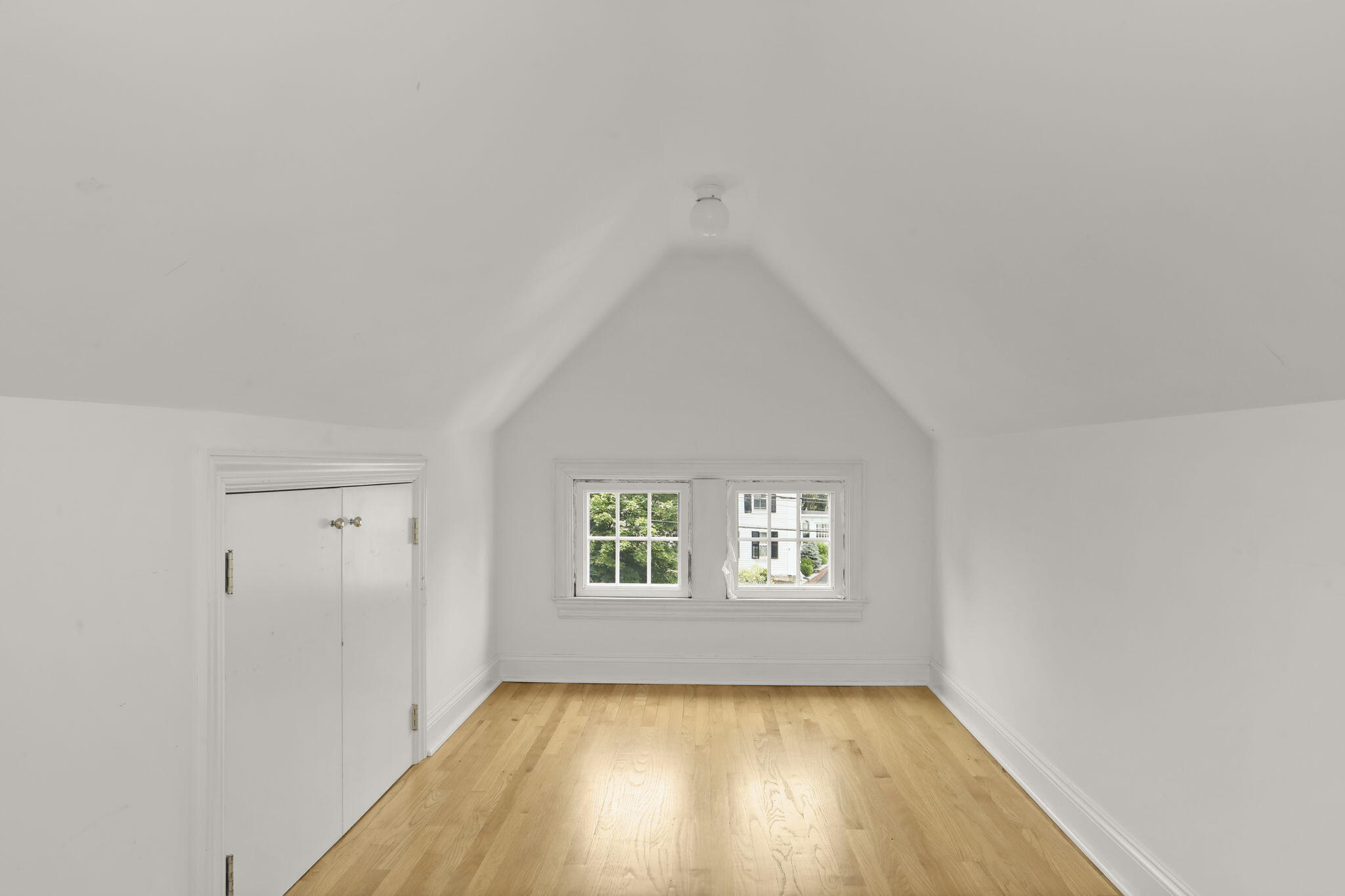 190 Main Street, Unit B New Canaan, CT 06840 - Photo 23 of 32 an empty room with windows