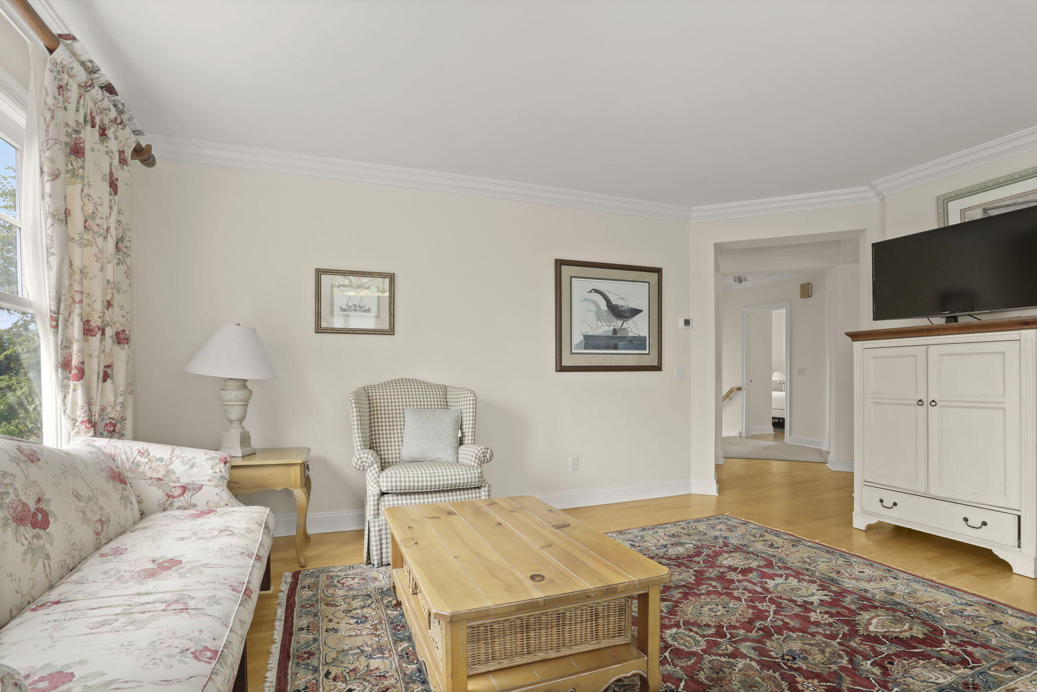 190 Main Street, Unit B New Canaan, CT 06840 - Photo 4 of 32 a living room with furniture and a flat screen tv