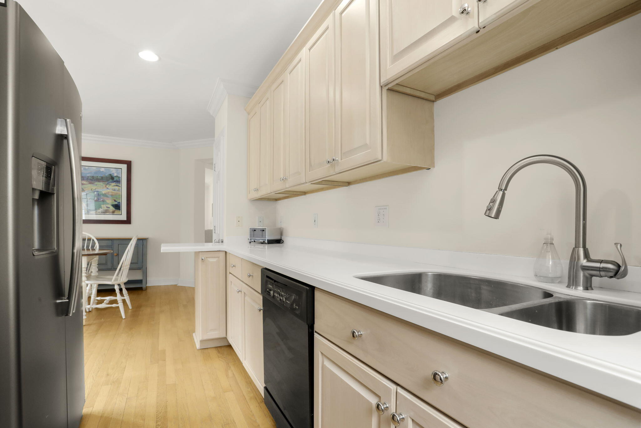 190 Main Street, Unit B New Canaan, CT 06840 - Photo 10 of 32 a kitchen with a sink and cabinets