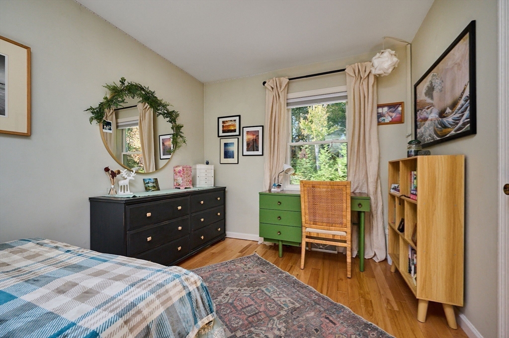 1260 Westhampton Road Northampton, MA 01062 - Photo 19 of 42 a bedroom with a bed and a dresser in it