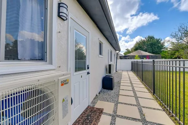 a view of a balcony with wooden floor