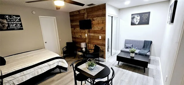 a bathroom with a shower and a toilet