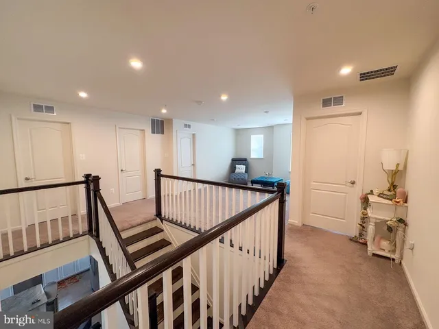 aerial view of a house with a yard