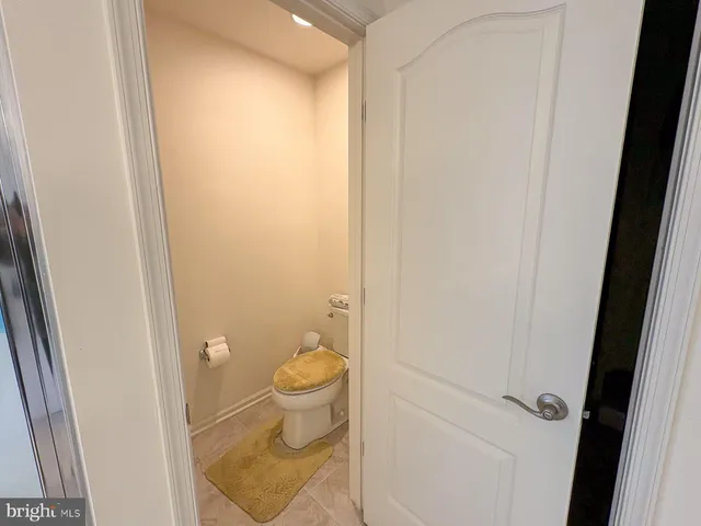 a bathroom with a sink vanity and a mirror