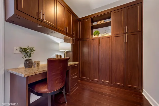 a workspace with furniture and window