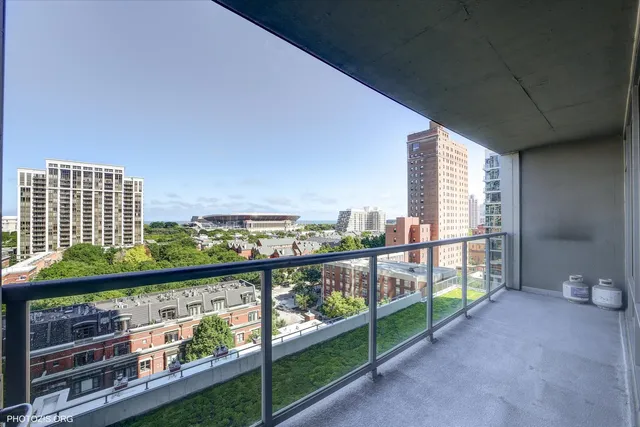 a view of a balcony with city view