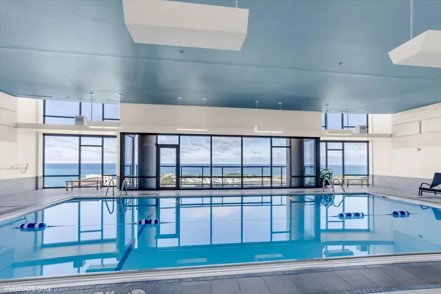 a view of a balcony with furniture